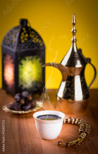 Arabian Coffee with dates and Ramadan lantern.