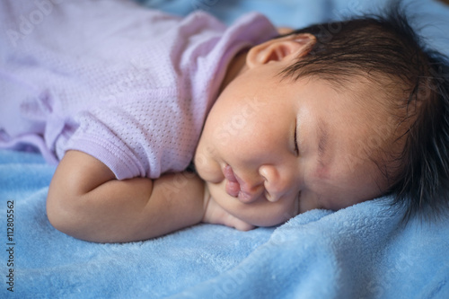 1-month-old baby was sleeping. select focus
