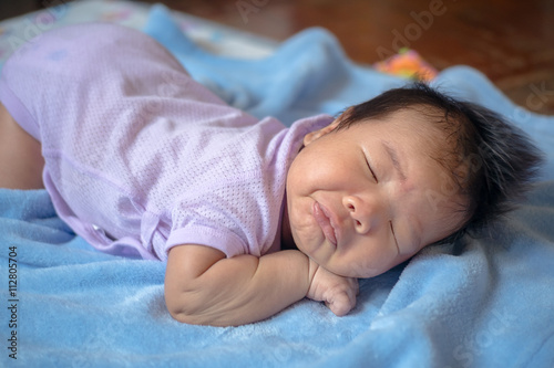 1-month-old baby was sleeping. select focus