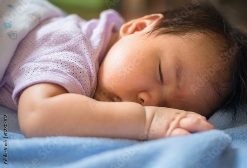 1-month-old baby was sleeping. select focus