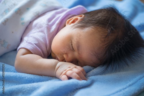 1-month-old baby was sleeping. select focus