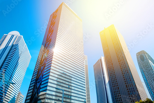 Canvas Print Business concept for real estate and corporate construction - looking up view in