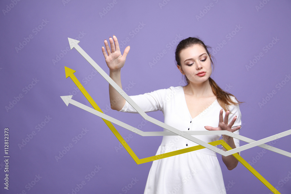 Businesswoman working with growth graph on violet background Businesswoman working with growth graph on violet background