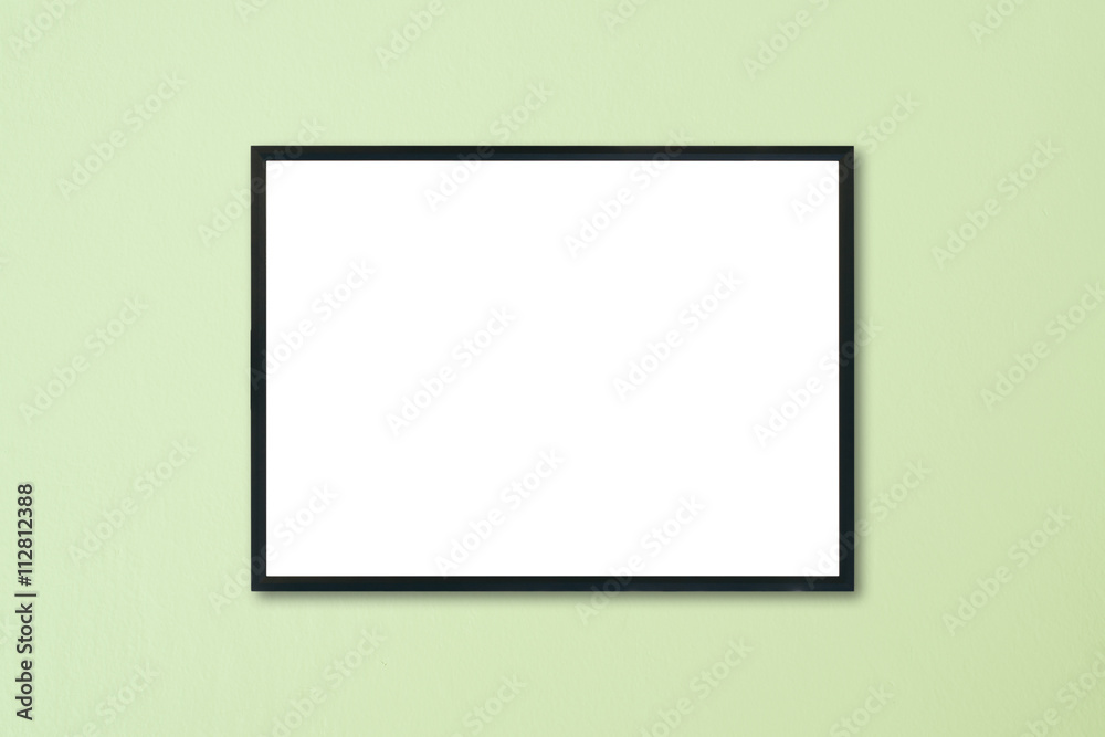 Mock up blank frame hanging on wall in room Mock up blank frame hanging on wall in room