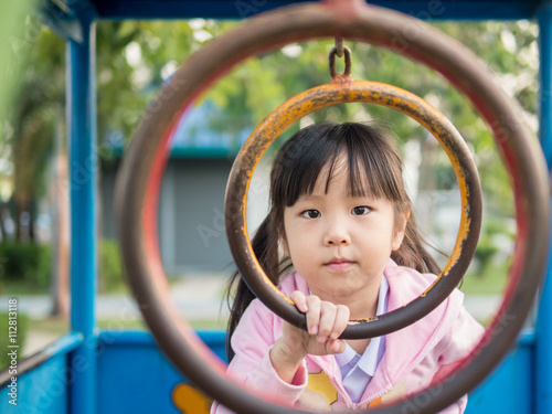 Happy kid, asian baby child playing on playground © bjginny