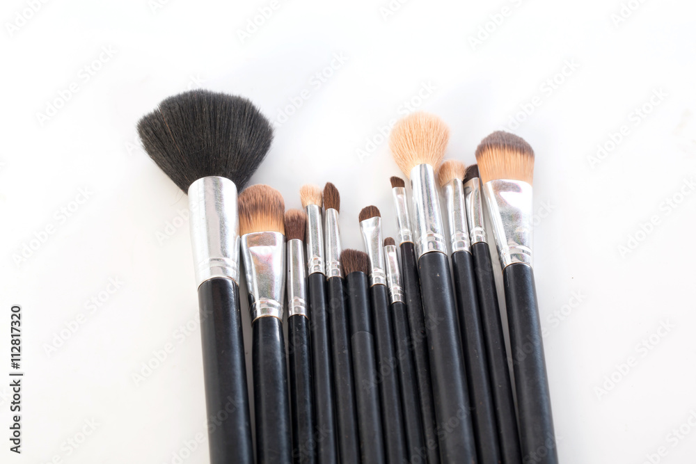 makeup brush to used on white background,selective focus makeup brush to used on white background,selective focus