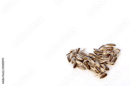 Sunflower seeds on white background , selective focus
