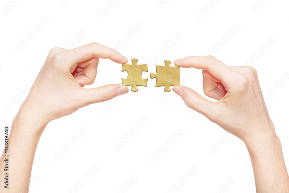 puzzle in hand isolated on white background puzzle in hand isolated on white background