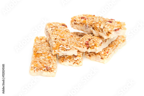 muesli bars with dried fruit on isolated background