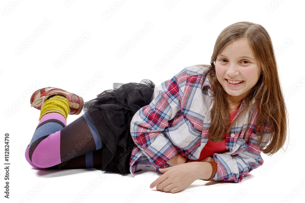 preteen girl in hipster style, lying on the floor preteen girl in hipster style, lying on the floor