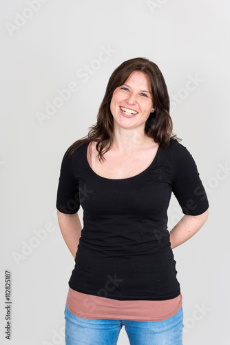 Smiling woman with look into the camera