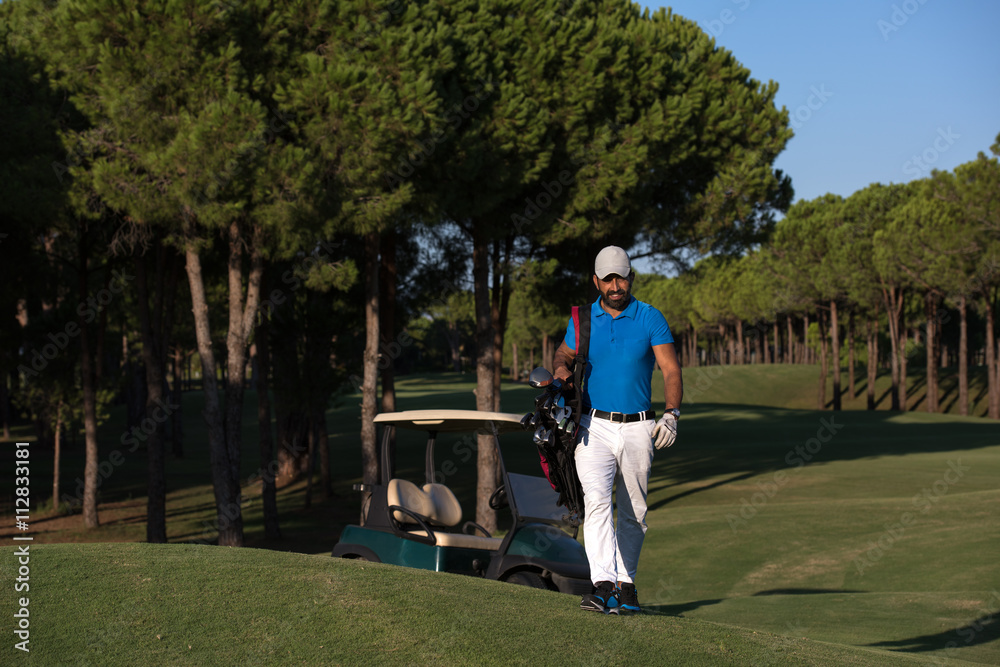 golfer walking and carrying golf bag golfer walking and carrying golf bag