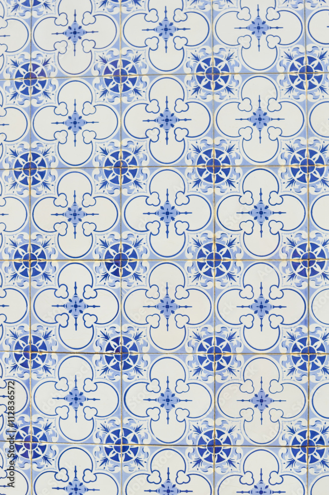 Closeup on traditional old tiles, detail of classic ceramic Portugal mosaic