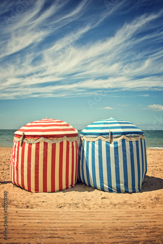Traditional beach umbrellas, Deauville Trouville beach, Normandy, France