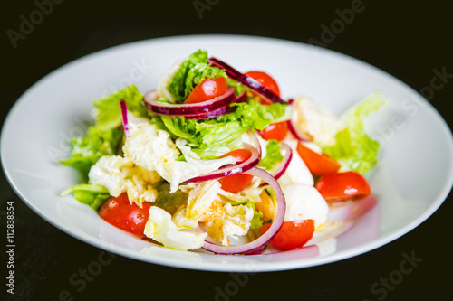 delicious vegetarian salad, salad with fruits and vegetables