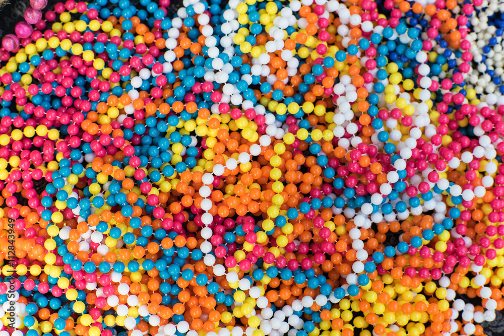 Bright plastic beads.