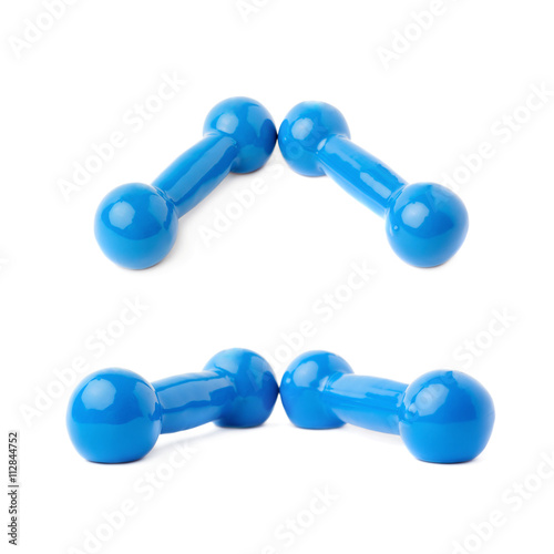 Set of Pair Plastic coated dumbells isolated over the white background