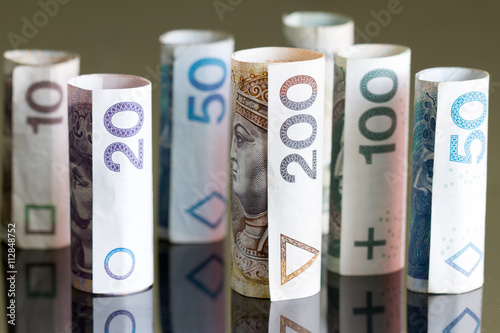 Quadro em tela Roll of banknotes polish money abstract
