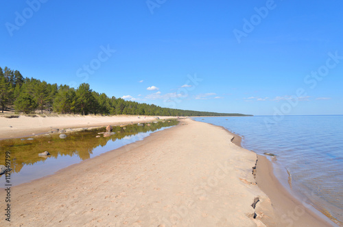 Fototapeta Naklejka Na Ścianę i Meble -  Beach on Ladoga lake at morning.