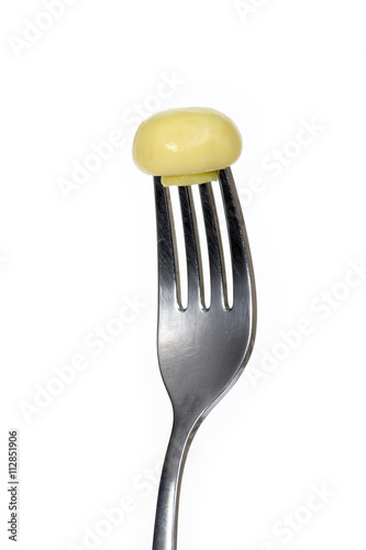 Champignon skewered in fork