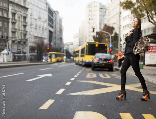 Woman crossing the street