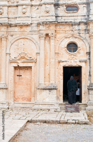 Priest walking in the church