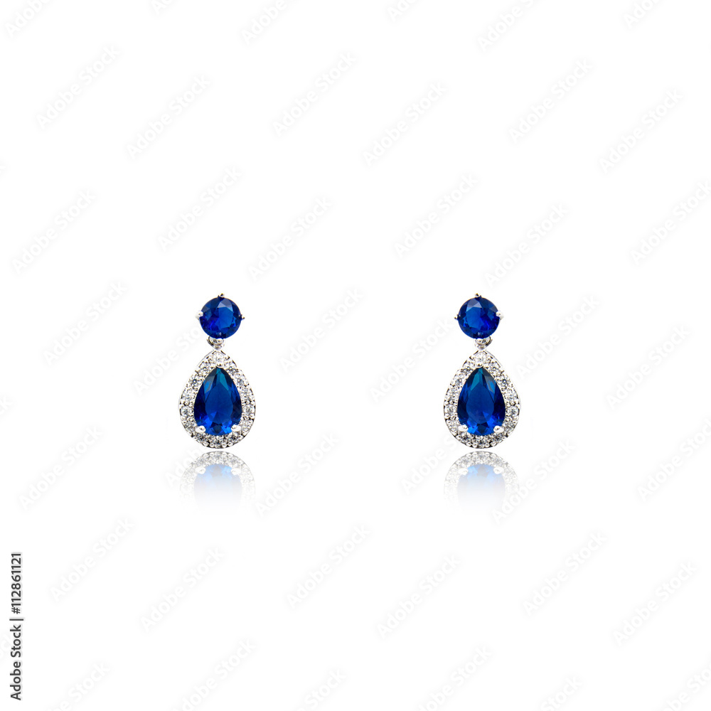 Pair of sapphire earrings isolated on white Pair of sapphire earrings isolated on white