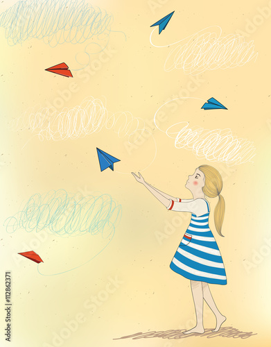 Little girl - the child, launches paper airplanes and dreams to fly.