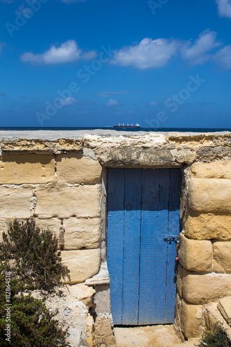 Blue gate  blue horizon and a sky  island Malta
