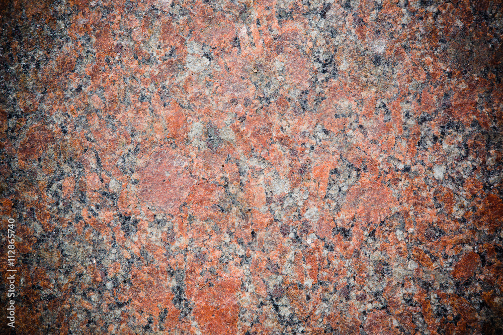 Stone Background of mottled red granite igneous rock Stone Background of mottled red granite igneous rock