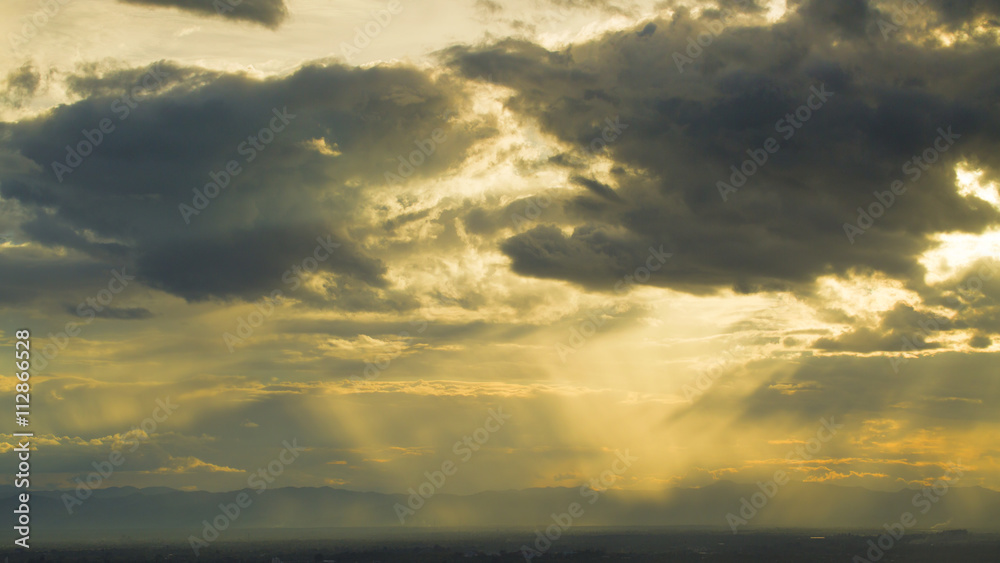 Clouds and Rainy Stormy Night with sun rays