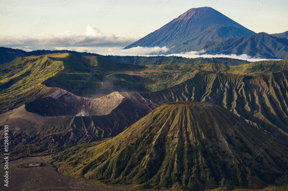 Mount Bromo volcano during sunrise, the magnificent view of Mt. Bromo located in Bromo Tengger Semeru National Park, East Java, Indonesia. Mount Bromo volcano during sunrise, the magnificent view of Mt. Bromo located in Bromo Tengger Semeru National Park, East Java, Indonesia.