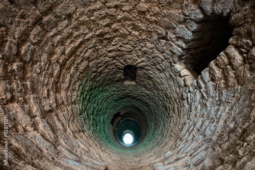 Deep medieval moorish well in Silves, Algarve, Portugal