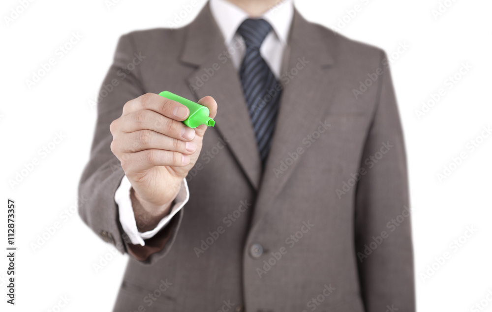 Fototapeta premium Businessman writing with green marker isolated on white with clipping path 