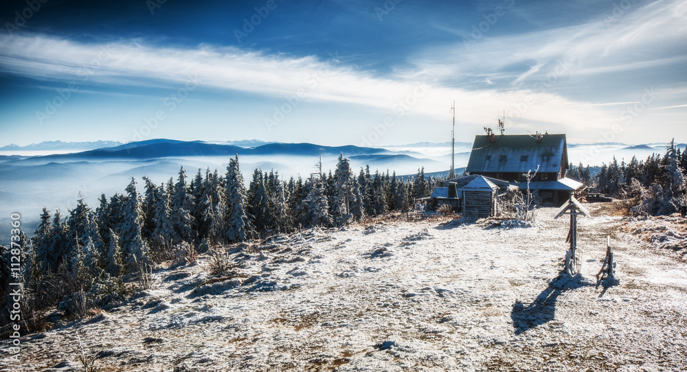Fototapeta premium Hut in mountin during winter