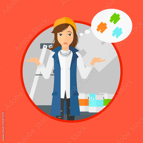 Woman choosing paint color.