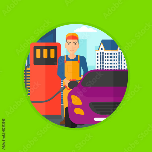 Worker filling up fuel into car.