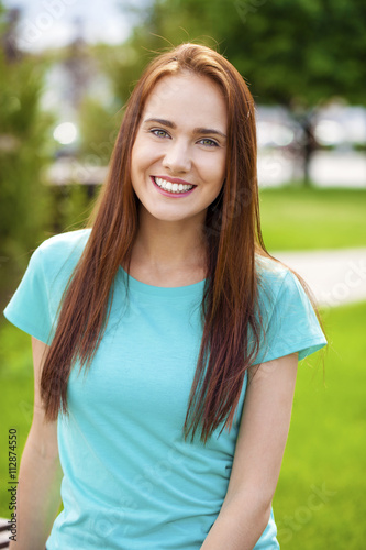 Portrait of beautiful young happy woman