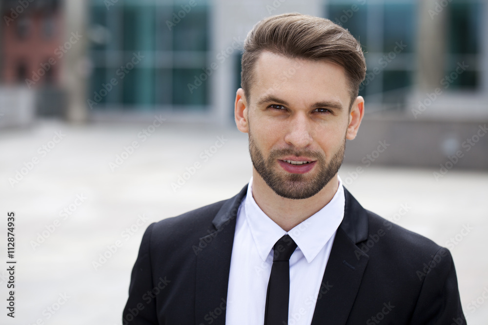 Portrait of a cheerful businessman