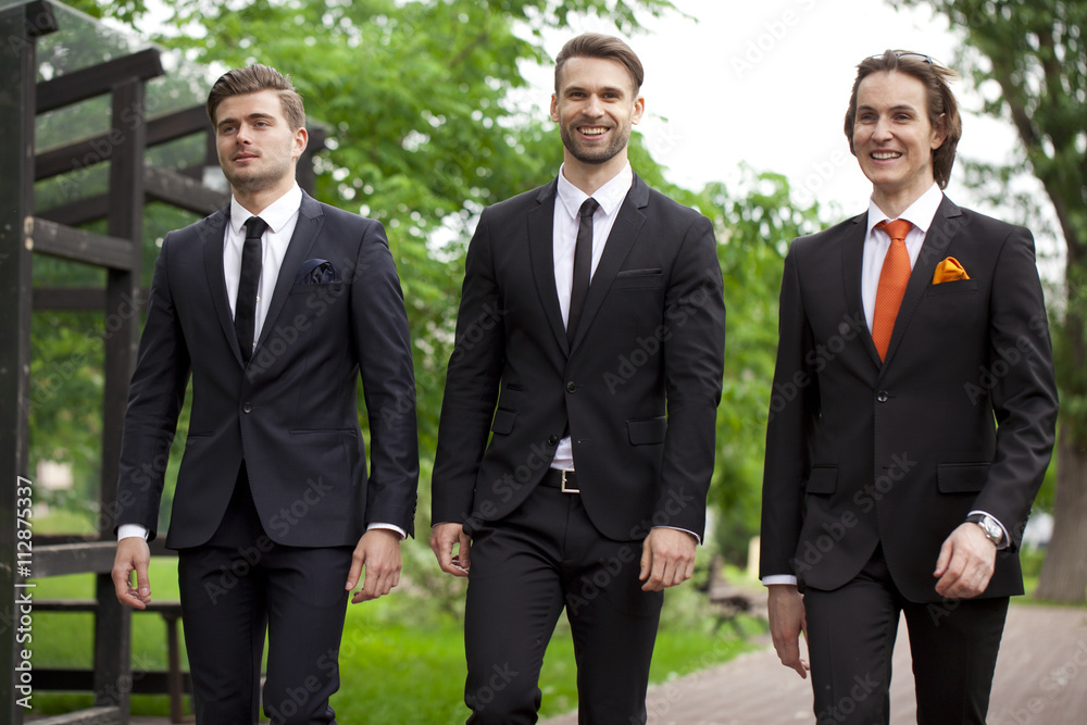Three young men in elegant business suits Three young men in elegant business suits