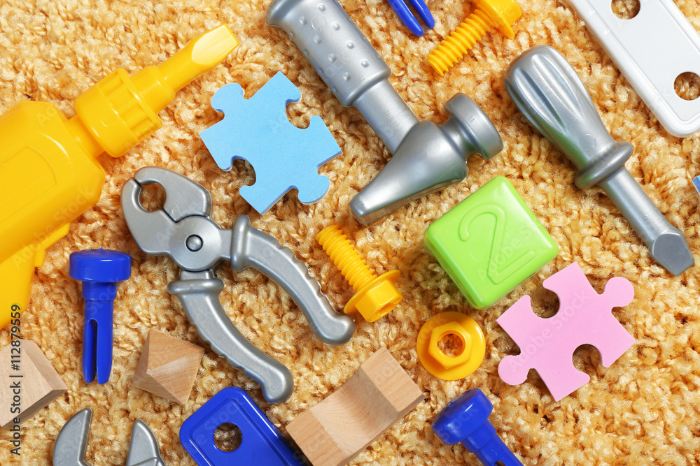 Colorful kids toys on carpet Colorful kids toys on carpet