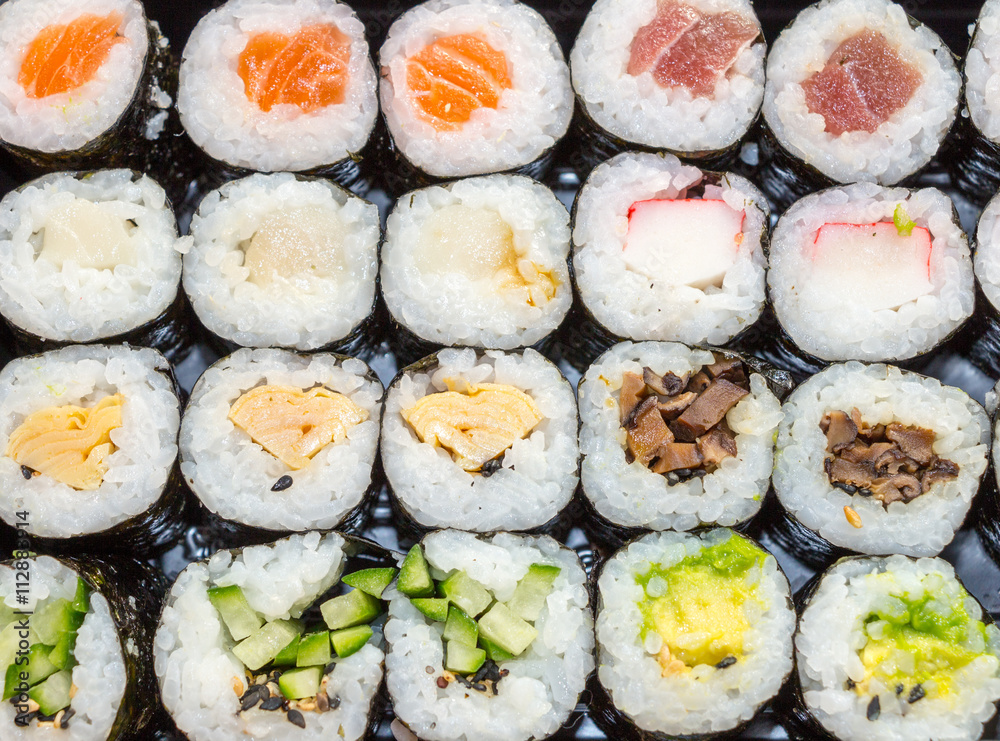 Various kinds of fresh sushi on the table Various kinds of fresh sushi on the table