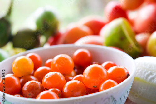 Cherry tomatoes on bowl
