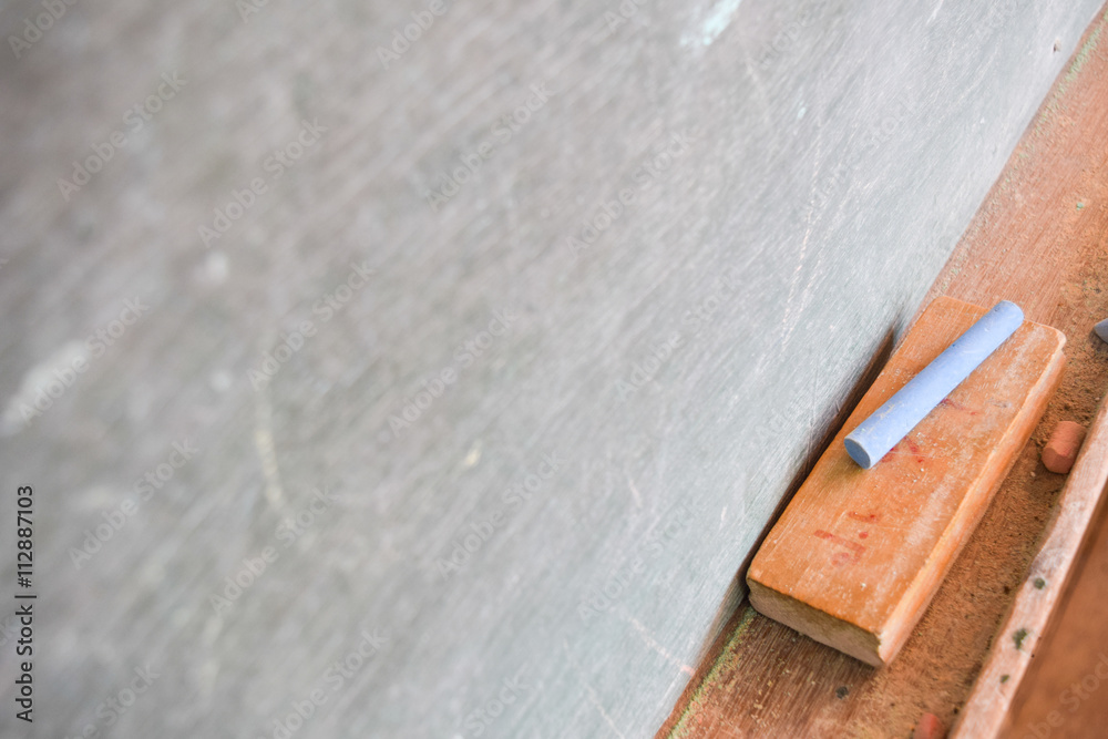 Blank blackboard with white chalk and eraser,back to school concept Blank blackboard with white chalk and eraser,back to school concept