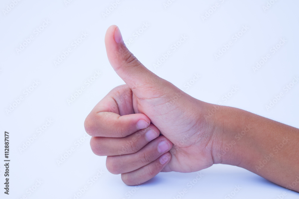 Hand with thumb up isolated on white background. Ok sign by woman Hand with thumb up isolated on white background. Ok sign by woman