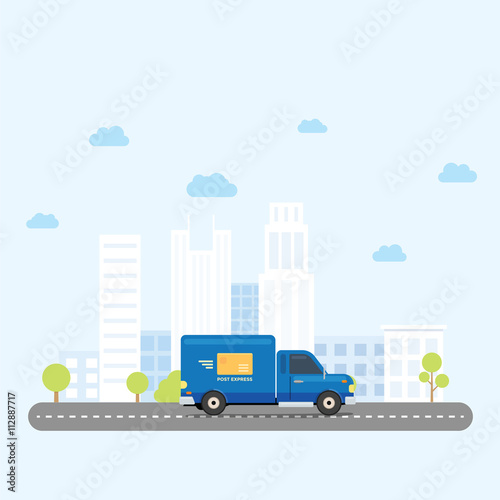 Van Truck post delivery across city at afternoon