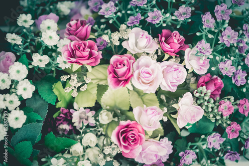 Close up colorful bunch of beautiful flowers.Vintage or retro tone. © narongchaihlaw