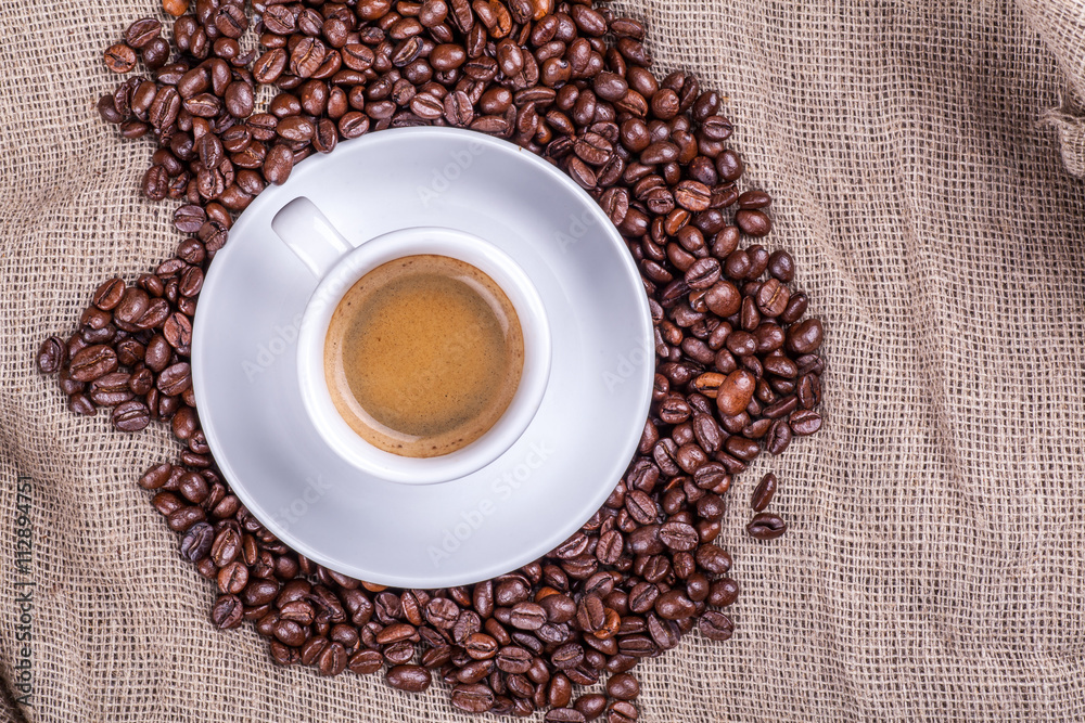 Cup and coffee beans Cup and coffee beans