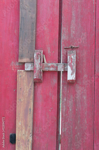 Old red closed door photo