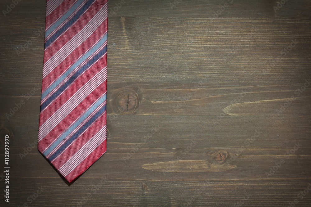 Happy father day, three ties on the wooden background